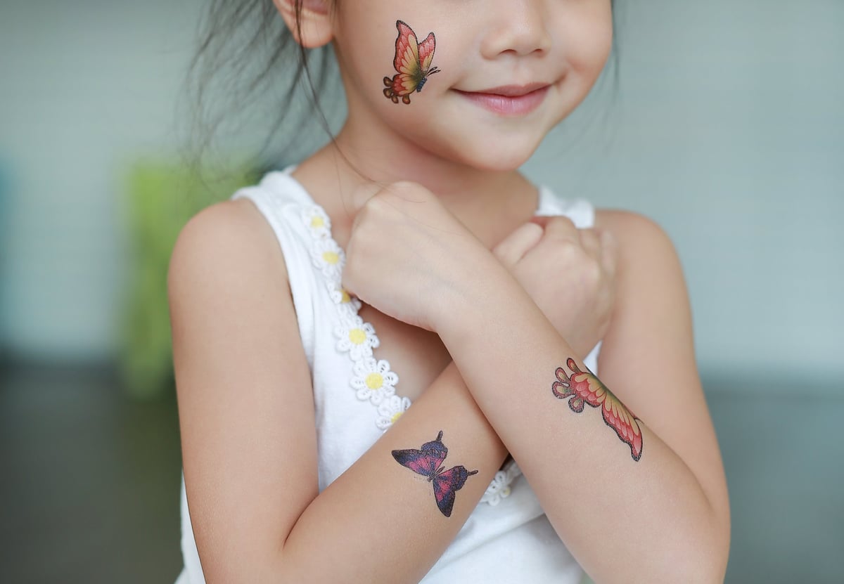 Temporary tattoo station for parties with butterfly tattoo designs for kids